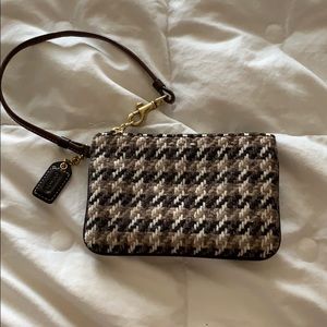patterned coach wristlet